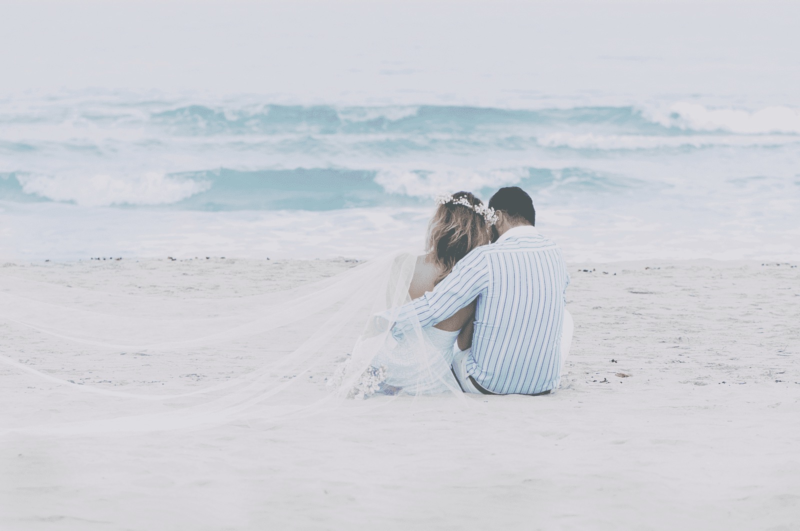A romantic beach wedding ceremony at golden hour on Florida's Gulf Coast