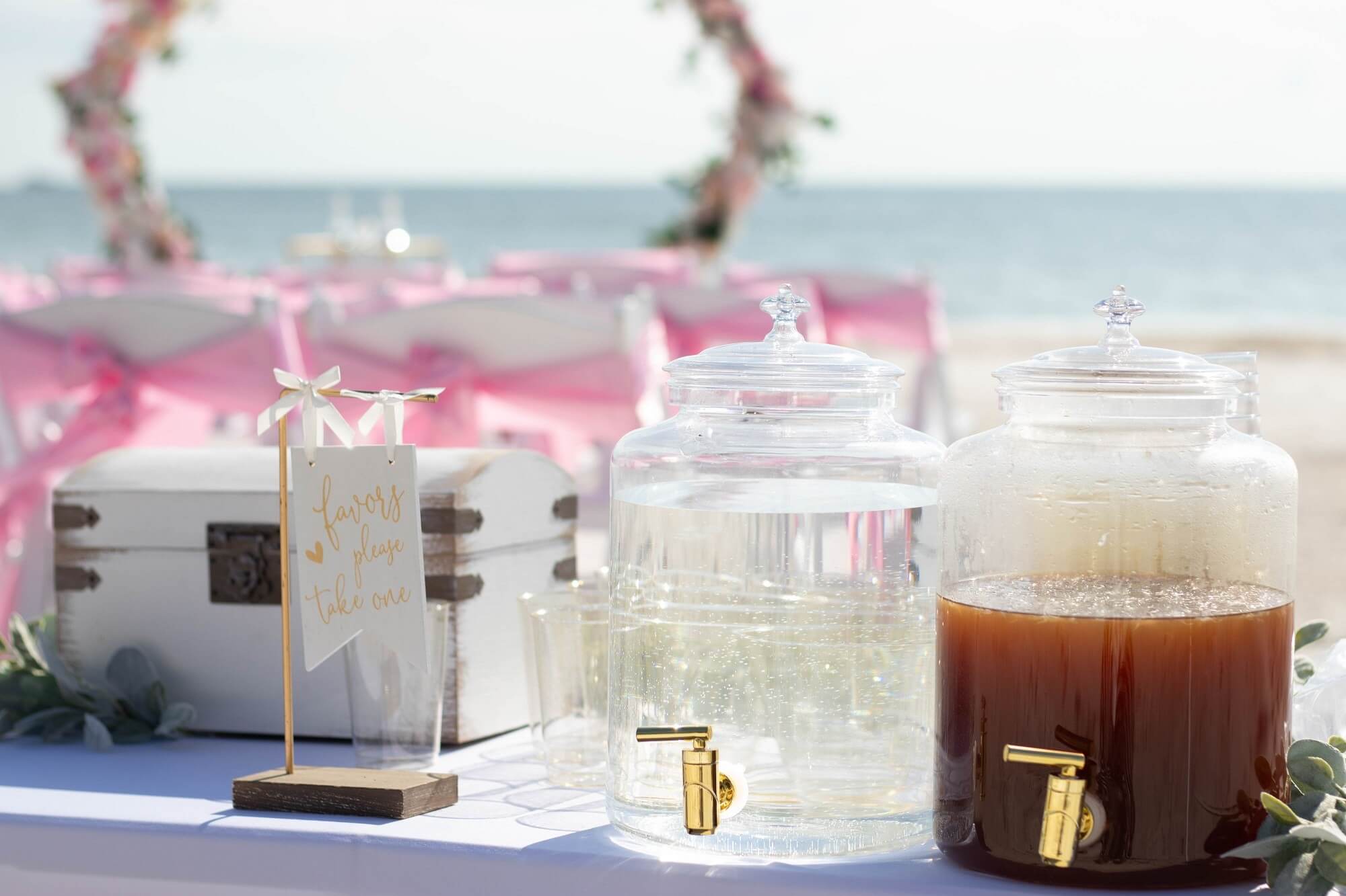 Beverage and favors table set up beachside on Treasure Island Beach