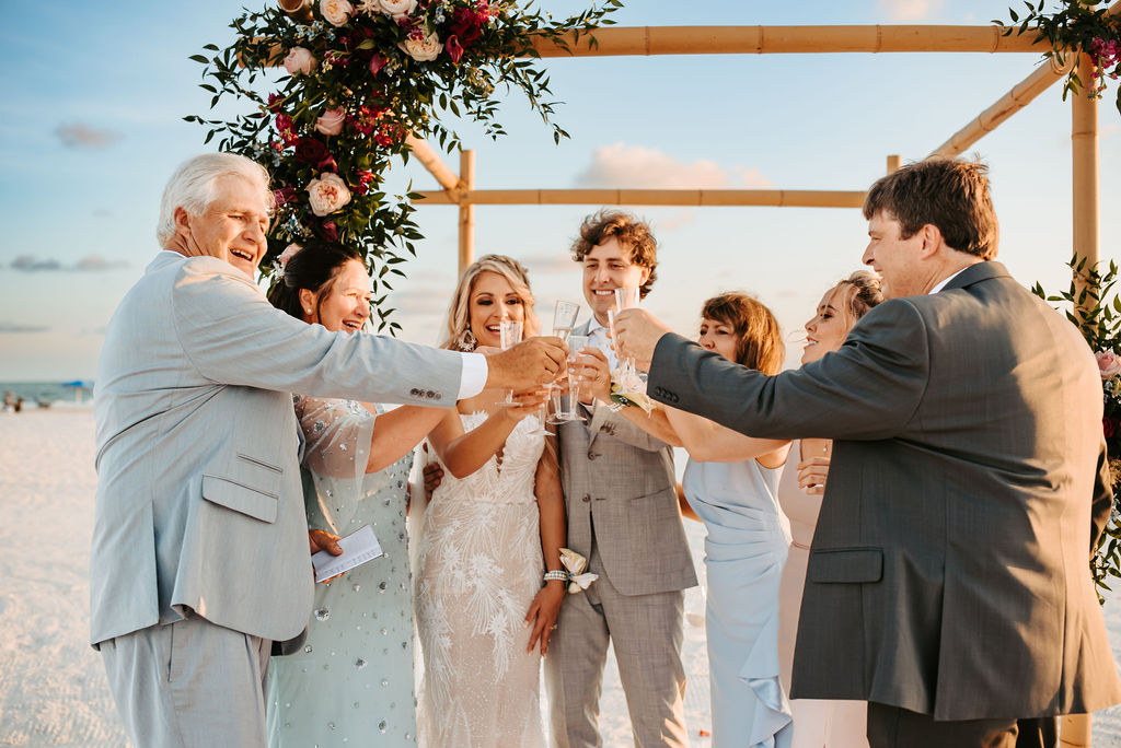 Beachfront wedding reception tent with decorated tables on Florida's Gulf Coast